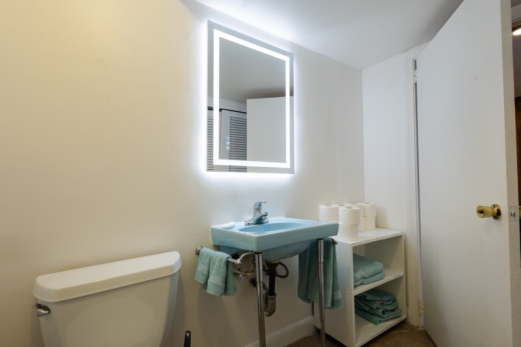 30 Leighton Road Boston, MA 02136 - Photo 21 of 38 a bathroom with a sink and a toilet