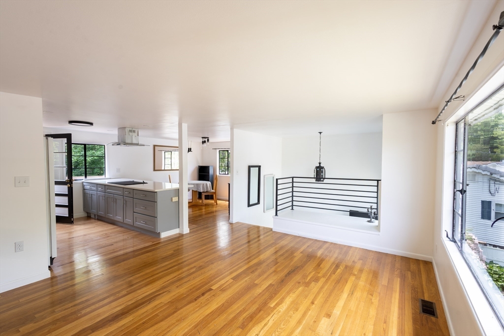 30 Leighton Road Boston, MA 02136 - Photo 8 of 38 a view of a living room kitchen and a wooden floor