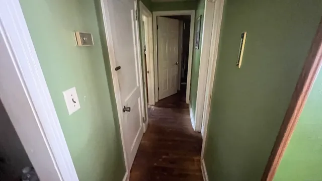 a view of hallway with stairs