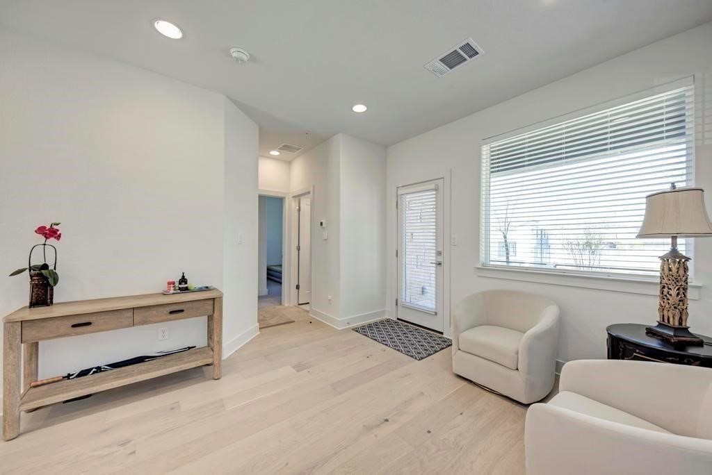 2050 Lohmans Spur Road, Unit 703 Lakeway, TX 78734 - Photo 13 of 14 Each floor has a living space, bedroom and full bath
