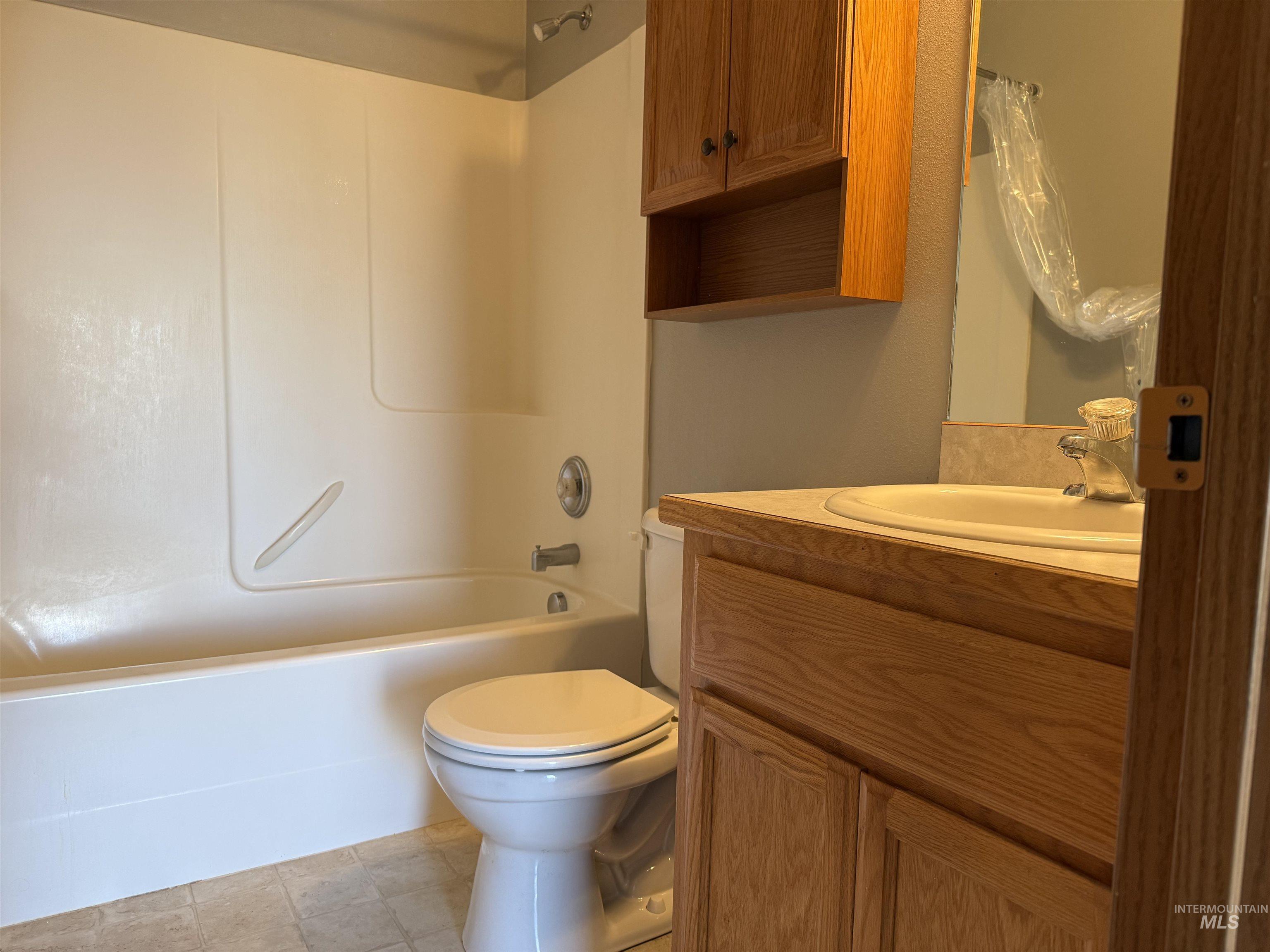 257 Pintail Lane Moscow, ID 83843 - Photo 15 of 28 Full bathroom with vanity and shower / bath combo with shower curtain