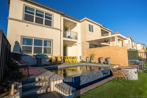 a front view of a house with patio
