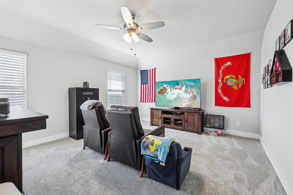 800 Majors Road Van Alstyne, TX 75495 - Photo 25 of 40 Cinema room with carpet, baseboards, and ceiling fan