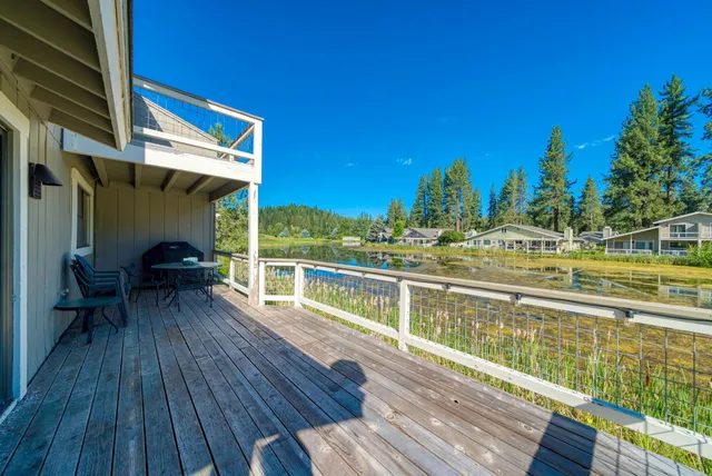 a view of a balcony with chairs