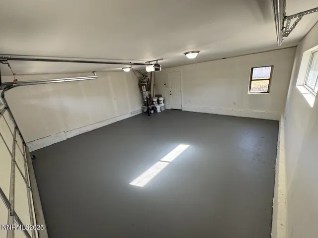 a view of a room with a hallway