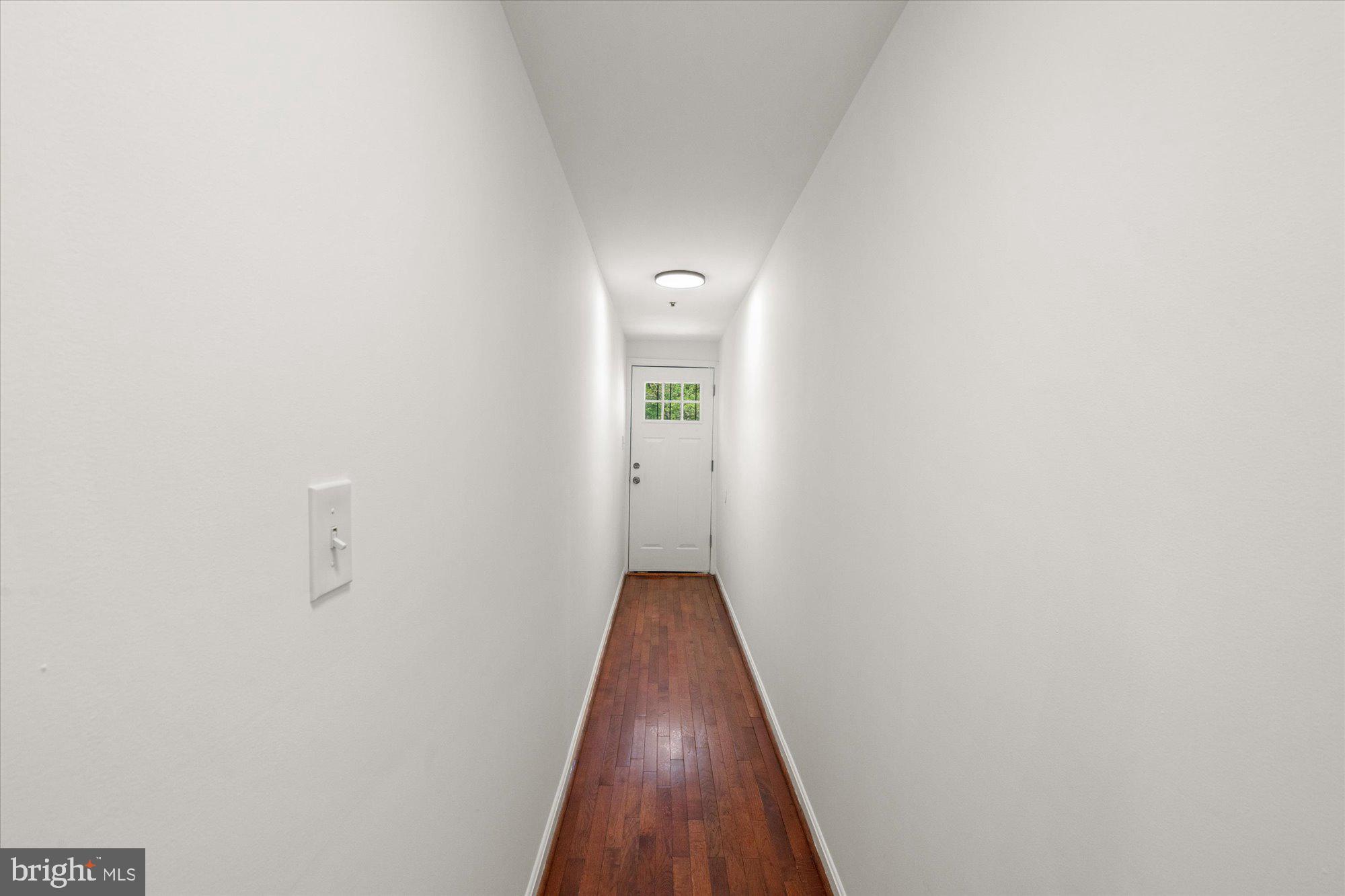 1241 18th Street Northeast, Unit 5 Washington, DC 20002 - Photo 20 of 23 Hallway to Back Stairs & Balcony