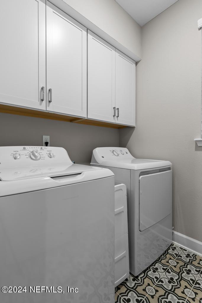 11232 Bright Path Jacksonville, FL 32256 - Photo 21 of 78 a utility room with dryer and washer