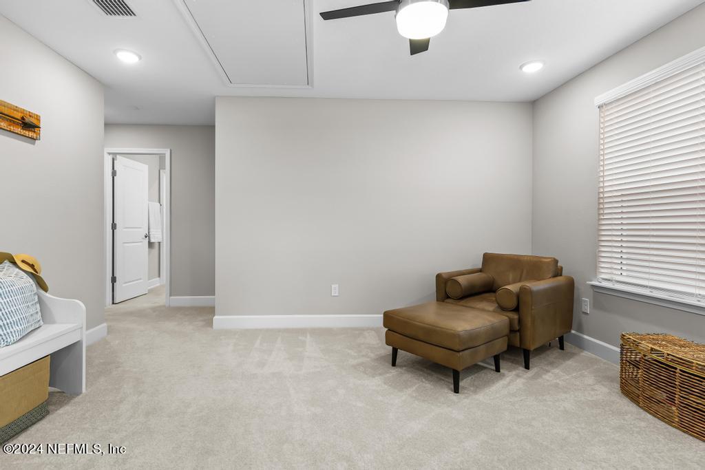 11232 Bright Path Jacksonville, FL 32256 - Photo 38 of 78 a living room with furniture and a window