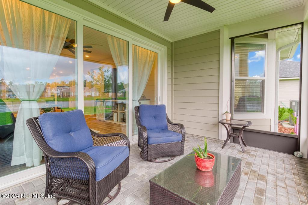 11232 Bright Path Jacksonville, FL 32256 - Photo 51 of 78 a outdoor living space with furniture and a garden