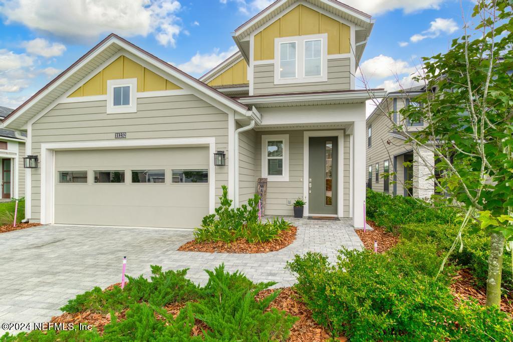 11232 Bright Path Jacksonville, FL 32256 - Photo 61 of 78 front view of a house with a yard