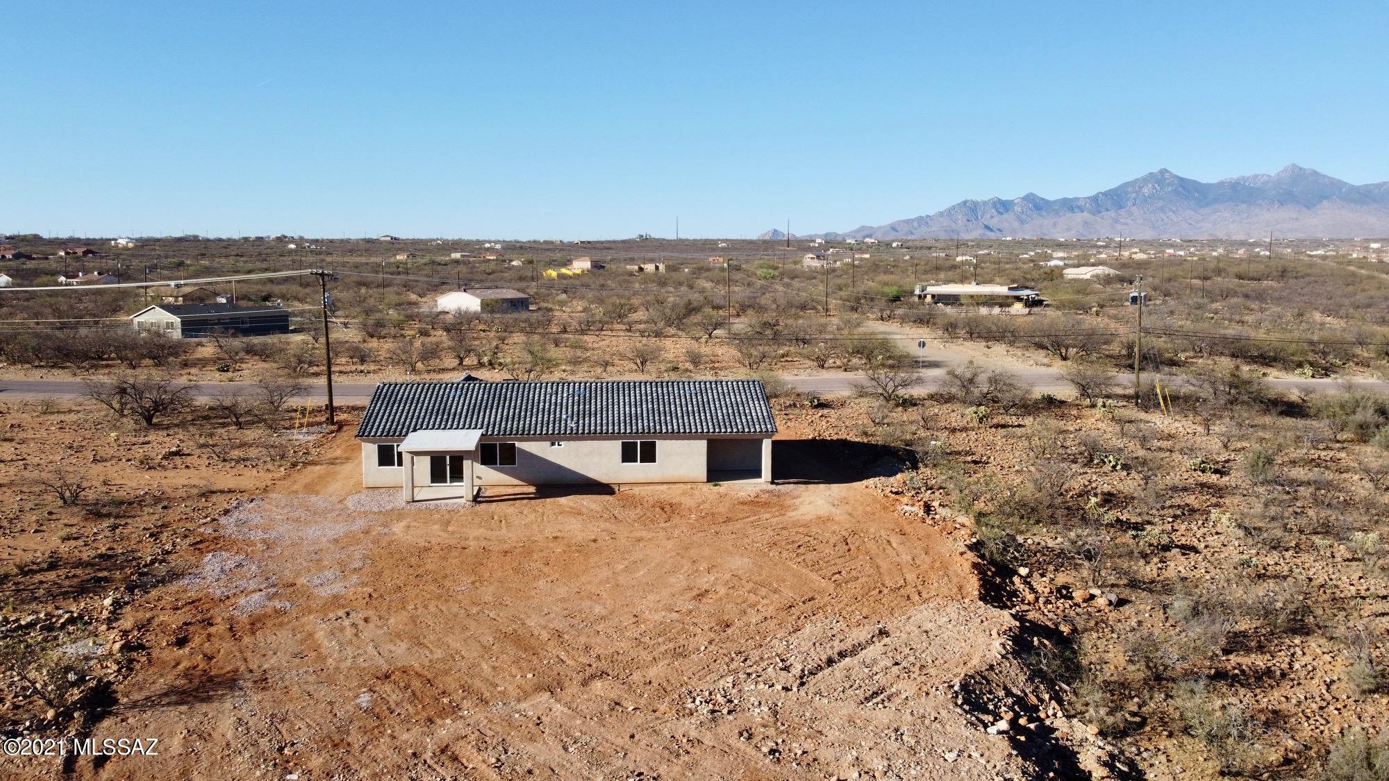 77 Ver Patria Rio Rico, AZ 85648 - Photo 41 of 50 an aerial view of residential houses with outdoor space and trees
