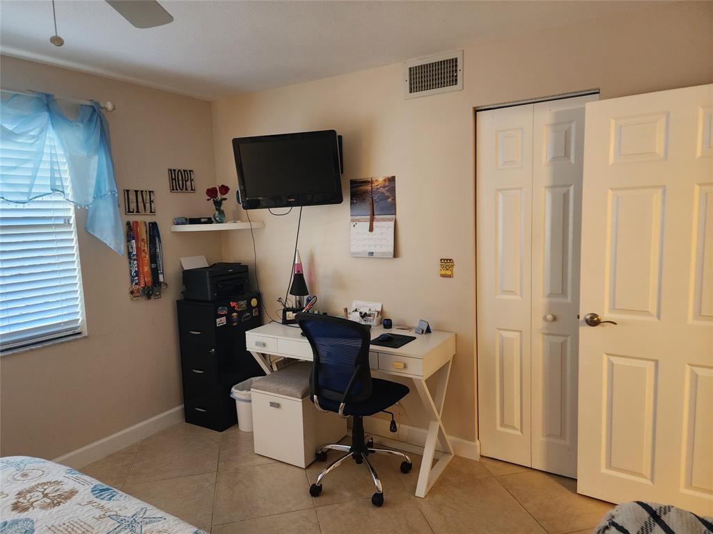 321 Southeast 3rd Street, Unit 302 Dania Beach, FL 33004 - Photo 13 of 23 Guest bedroom