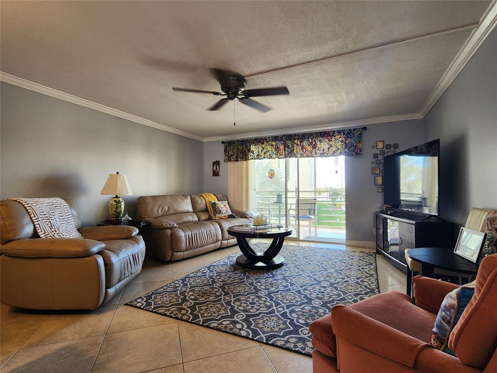 321 Southeast 3rd Street, Unit 302 Dania Beach, FL 33004 - Photo 2 of 23 Living room