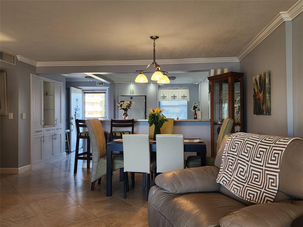 321 Southeast 3rd Street, Unit 302 Dania Beach, FL 33004 - Photo 4 of 23 Living/dining combo