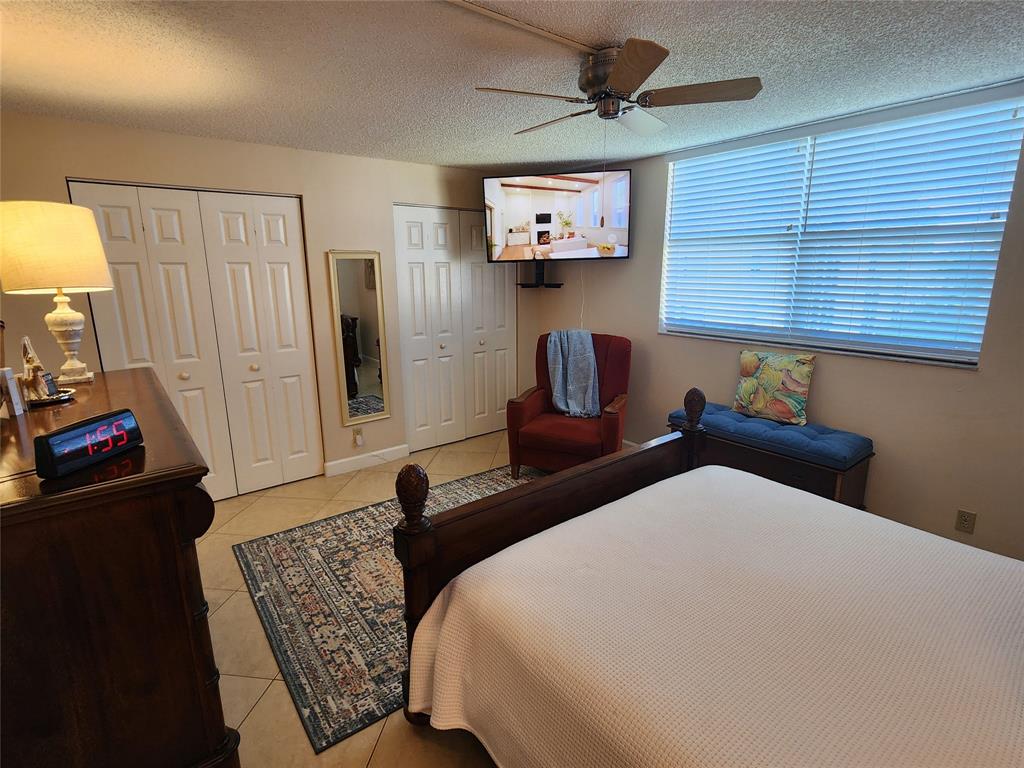 321 Southeast 3rd Street, Unit 302 Dania Beach, FL 33004 - Photo 9 of 23 Main suite has 4 closets