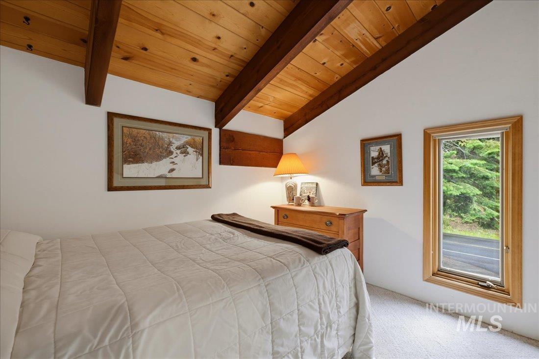 3800 Warren Wagon Road McCall, ID 83638 - Photo 26 of 50 Vaulted wood-paneled ceiling with exposed beams