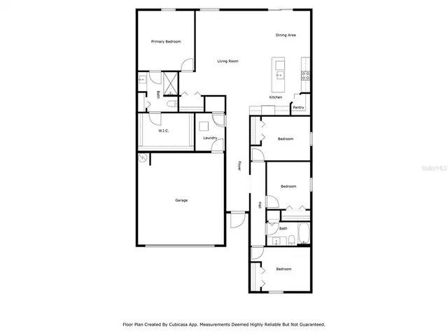 an aerial view of multiple houses with a yard