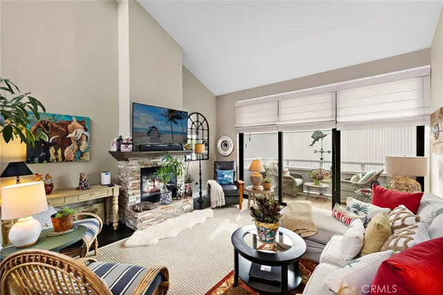 a living room with furniture chess table and a large window