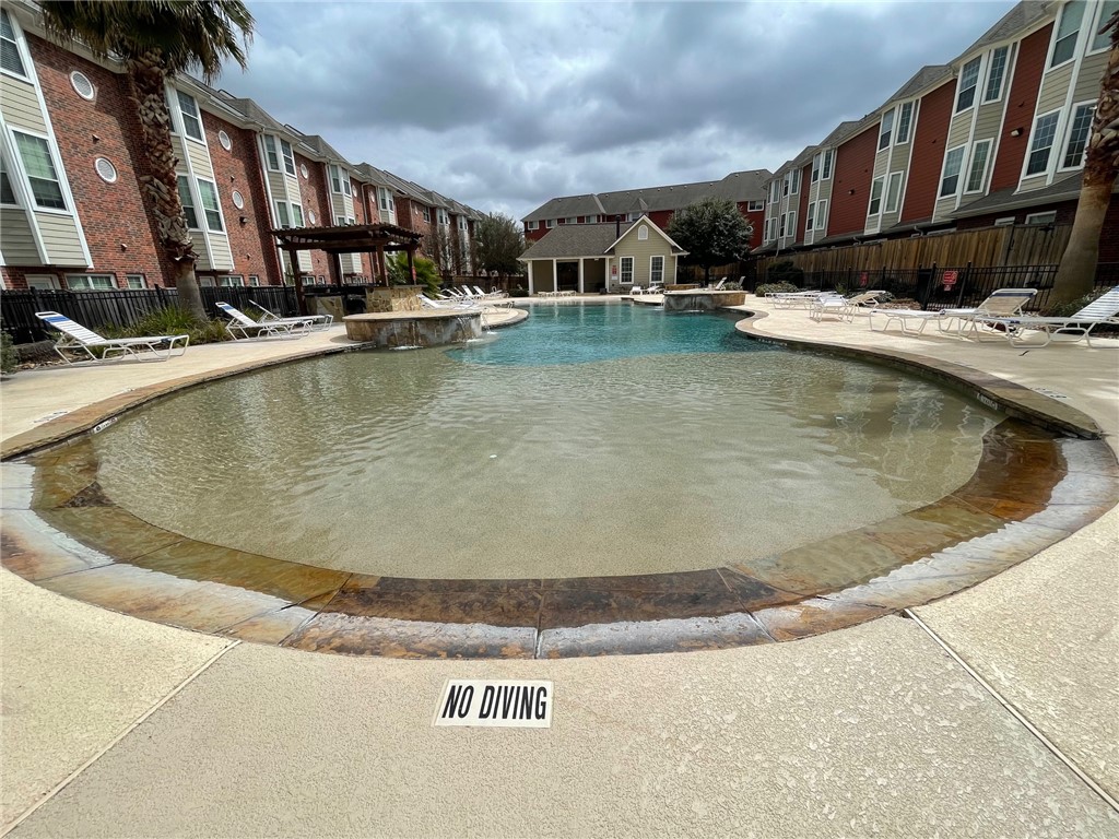 1198 Jones-Butler Road, Unit 2706 College Station, TX 77840 - Photo 16 of 17 a view of a house with swimming pool