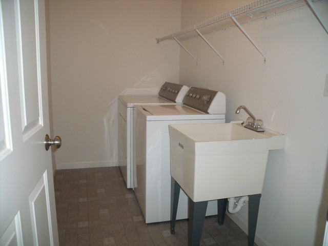 2123 Autumn Lane, Unit 2123 DeKalb, IL 60115 - Photo 9 of 12 a utility room with dryer and washer