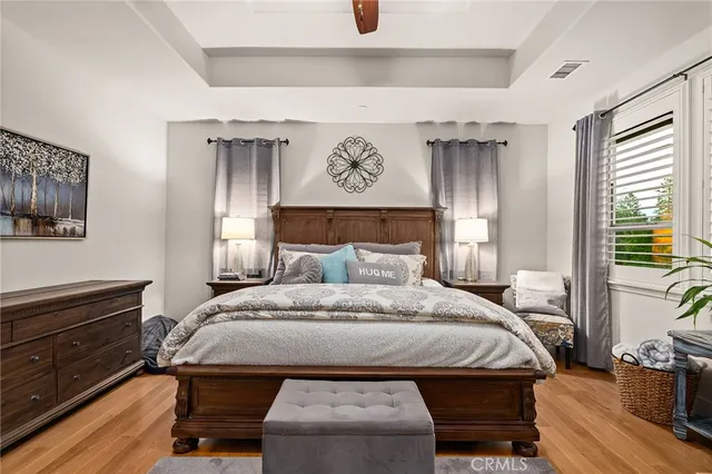 a view of walk in closet with clothes