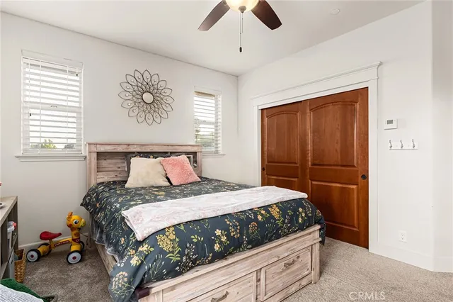 a living room with furniture and a painting