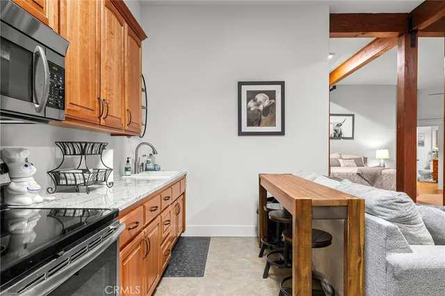 a bedroom with bed and a window