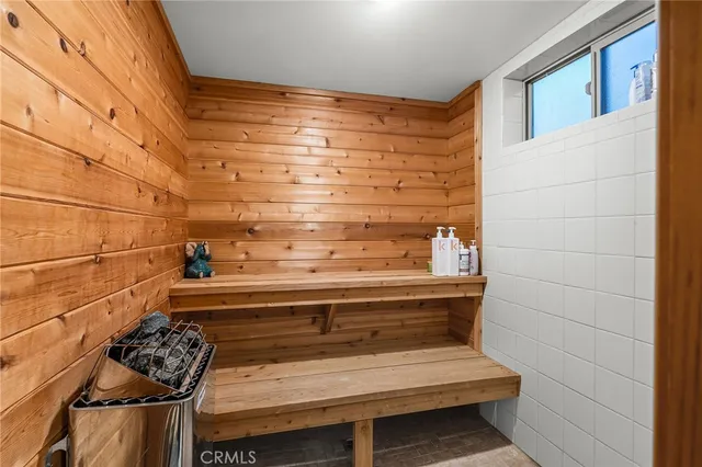 a view of a garage with parked cars