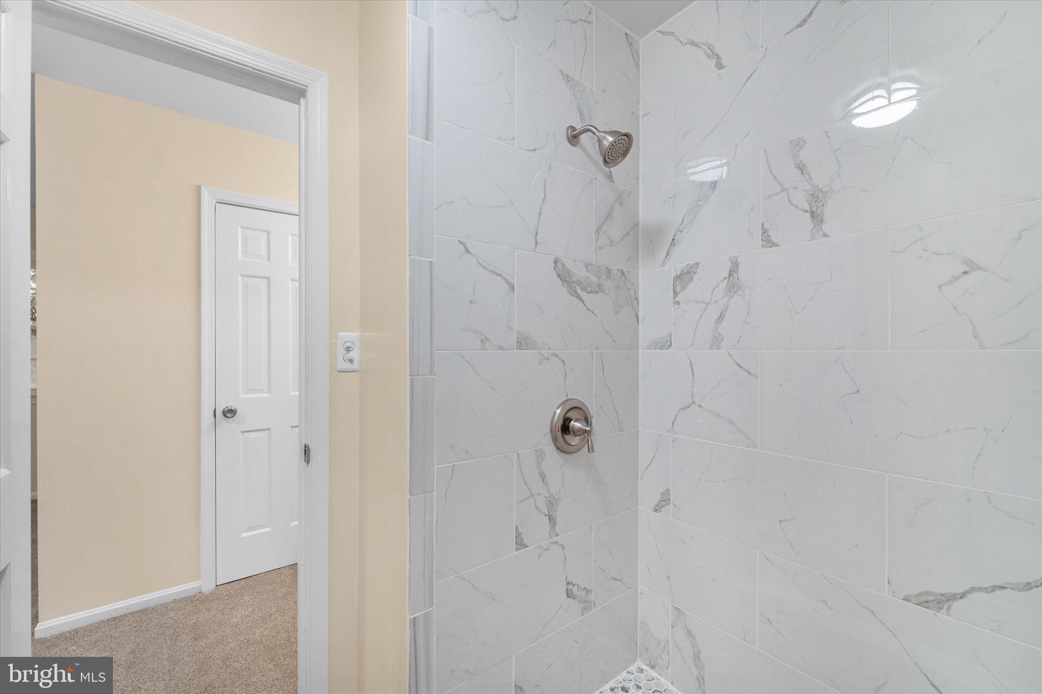 8016 Stillbrooke Road Manassas, VA 20112 - Photo 24 of 41 a bathroom with a shower
