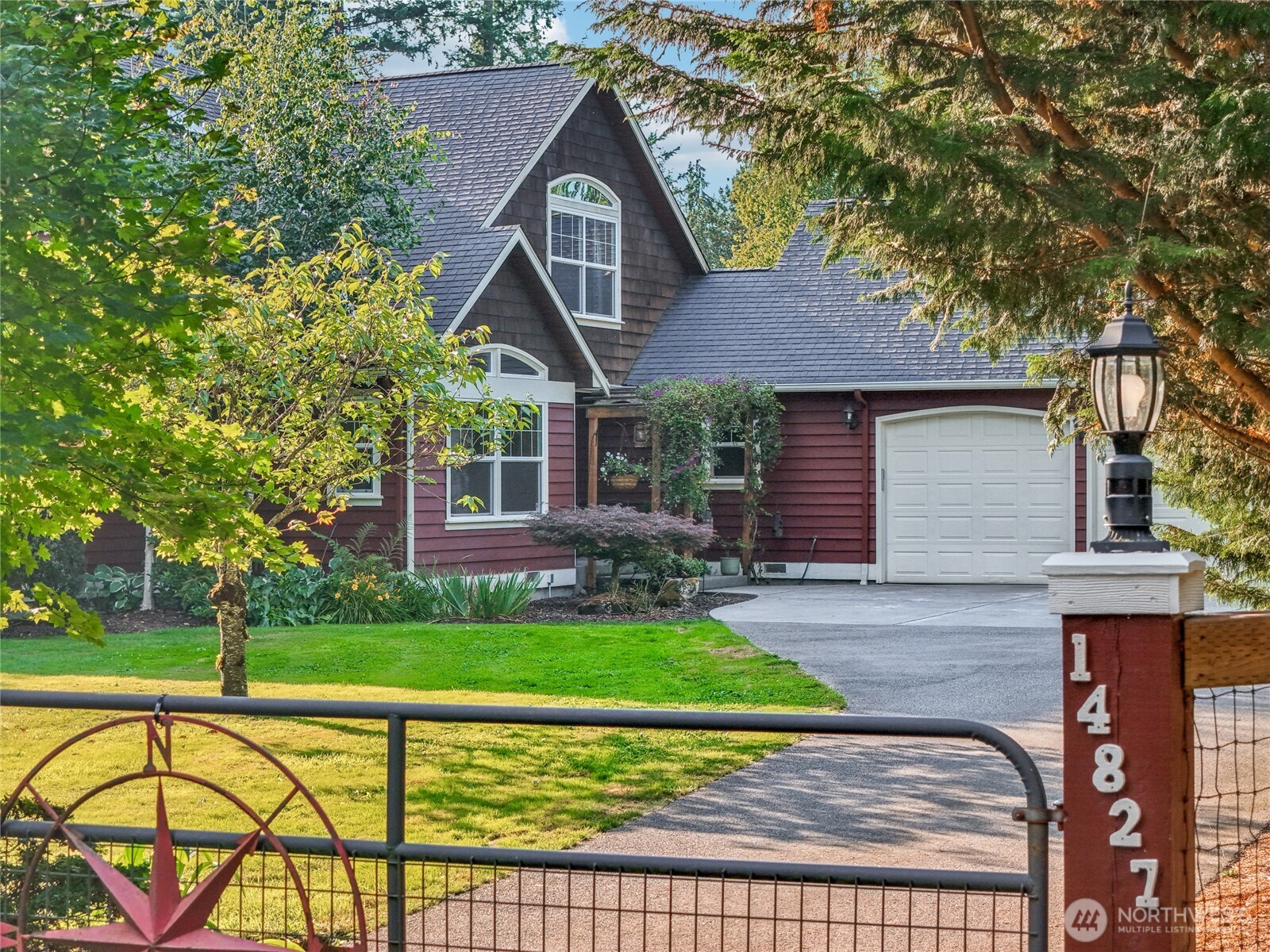 14827 Three Lakes Road Snohomish, WA 98290 - Photo 1 of 39 a front view of a house with a yard