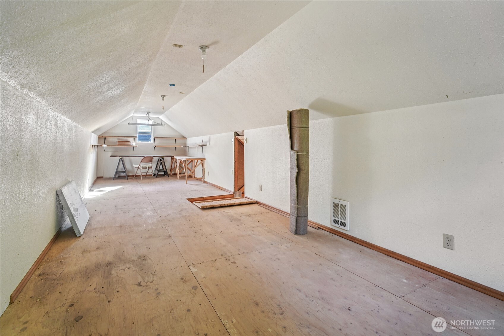 14827 Three Lakes Road Snohomish, WA 98290 - Photo 23 of 39 a view of a livingroom with stairs and a large window