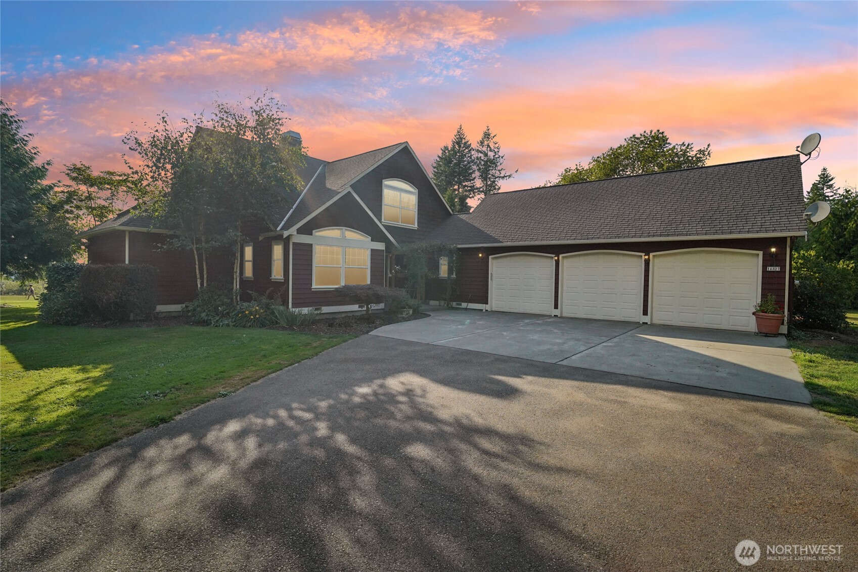 14827 Three Lakes Road Snohomish, WA 98290 - Photo 39 of 39 a front view of a house with a garden and trees