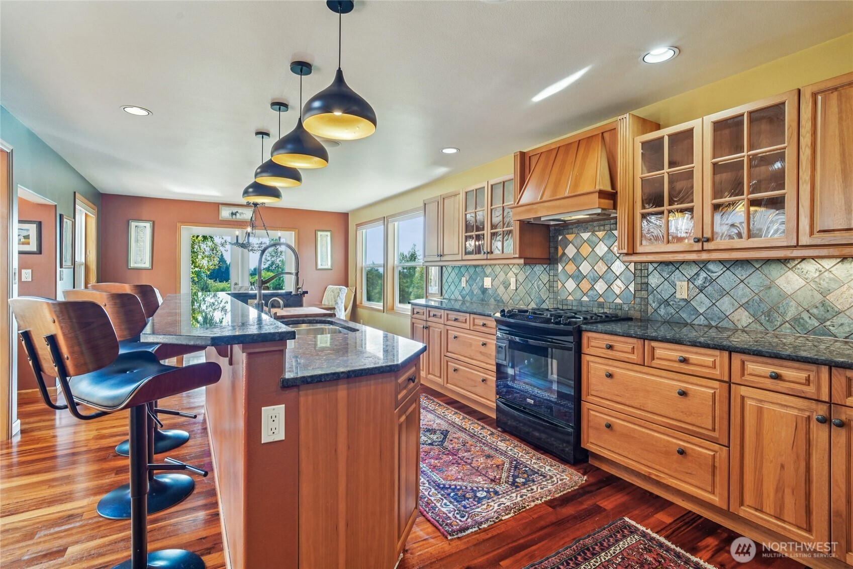14827 Three Lakes Road Snohomish, WA 98290 - Photo 8 of 39 a kitchen with sink and chairs