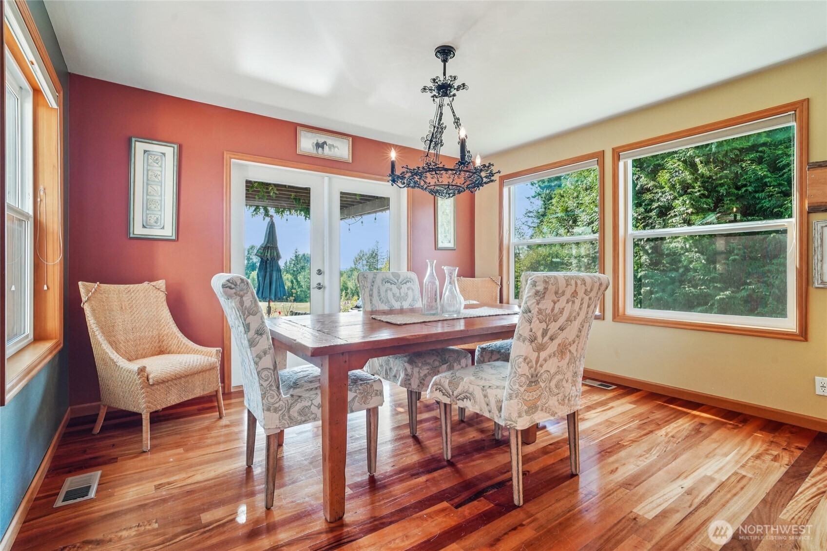 14827 Three Lakes Road Snohomish, WA 98290 - Photo 9 of 39 a view of a dining room with furniture window and wooden floor