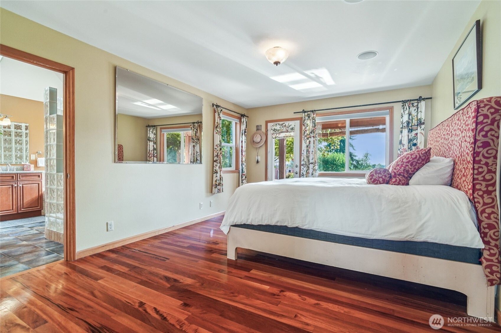 14827 Three Lakes Road Snohomish, WA 98290 - Photo 10 of 39 a bed sitting in a spacious bedroom next to a window