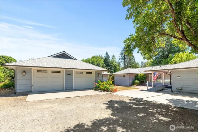 a front view of a house with a garage