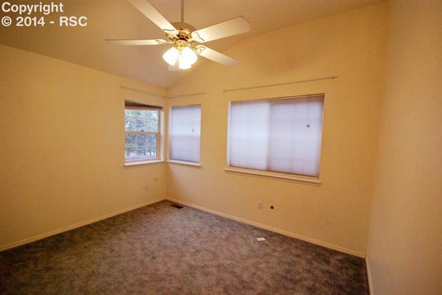 9575 Hardin Road Colorado Springs, CO 80908 - Photo 21 of 24 3rd of 3 secondary bedrooms upstairs.