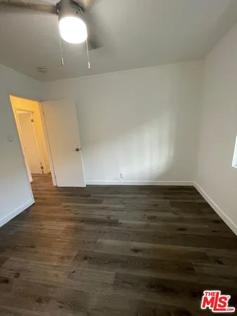 a view of a house with a street