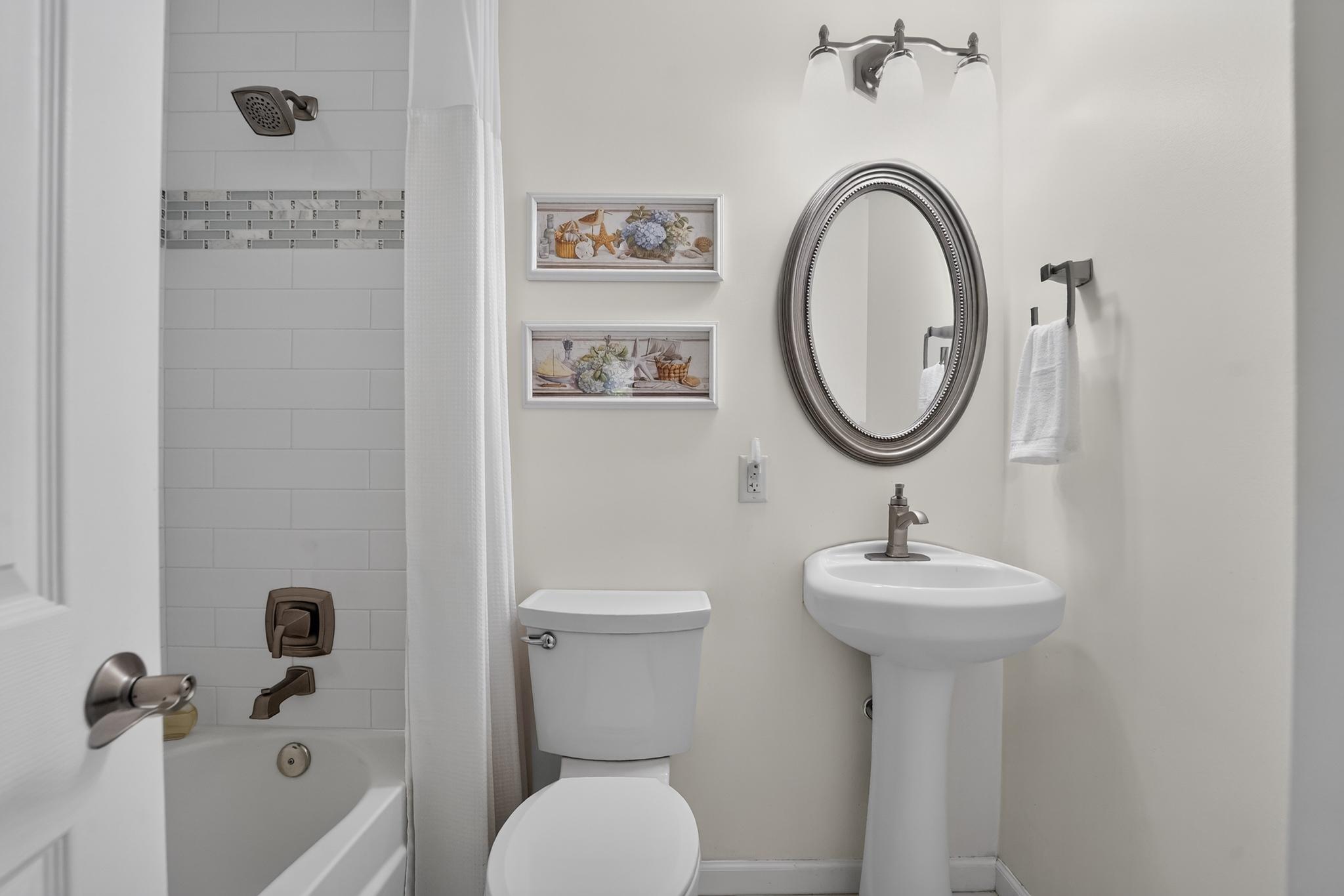 221 Atlanta Road Pasadena, MD 21122 - Photo 22 of 38 Updated Upper Level Hallway FULL Bathroom