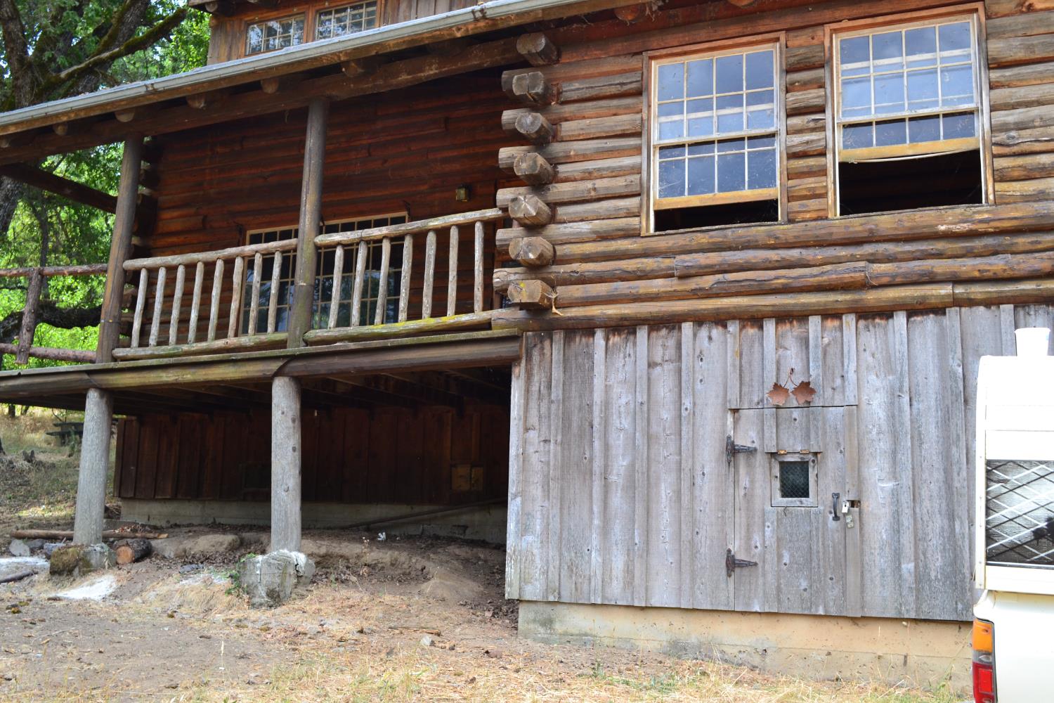 8600 Lodestone Road Somerset, CA 95684 - Photo 40 of 63 a view of a house with a window and wooden fence