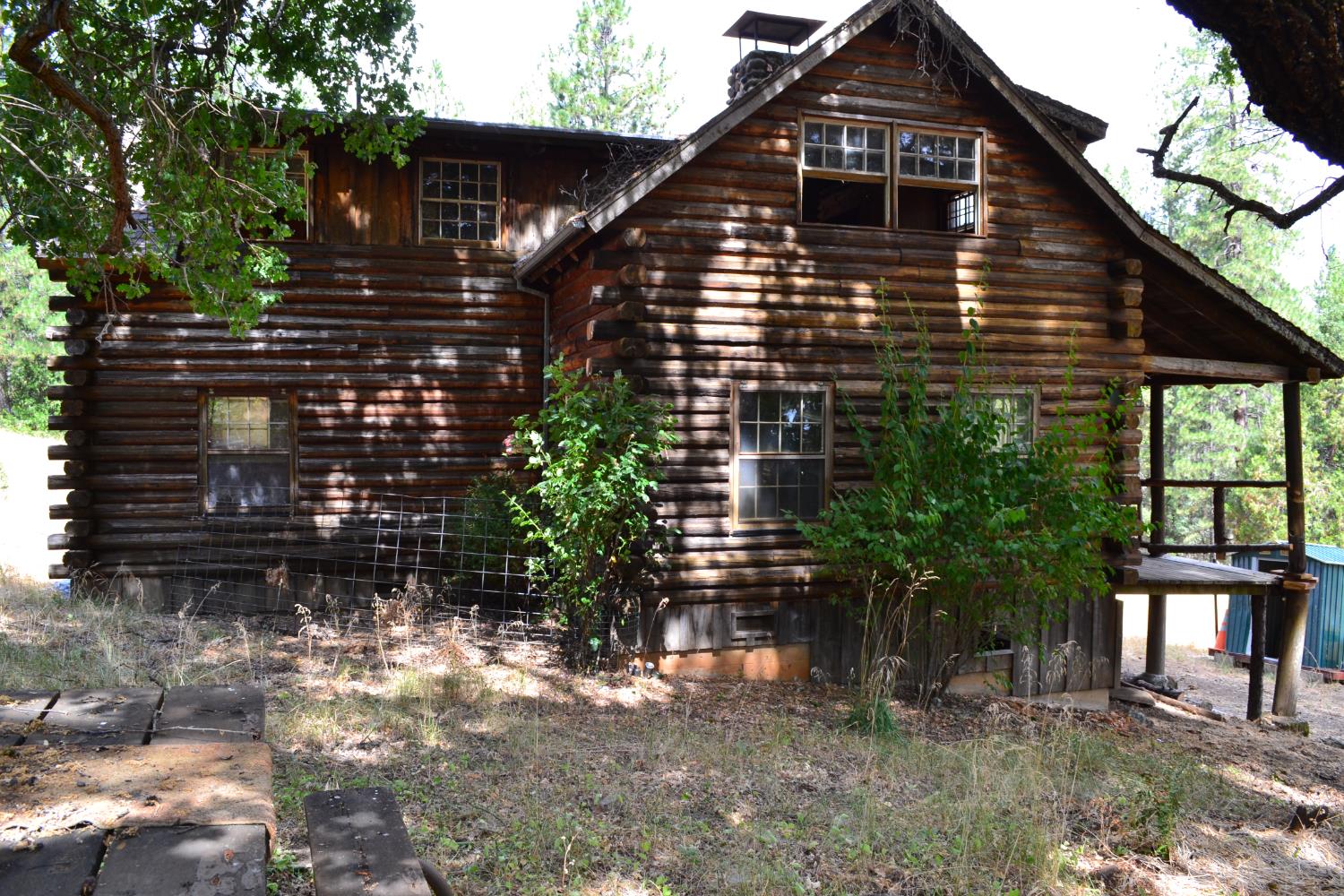 8600 Lodestone Road Somerset, CA 95684 - Photo 48 of 63 a front view of a house with a yard