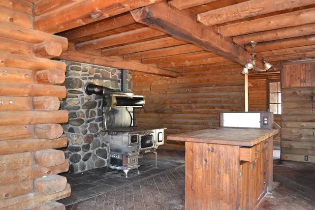 a view of a backyard with chairs