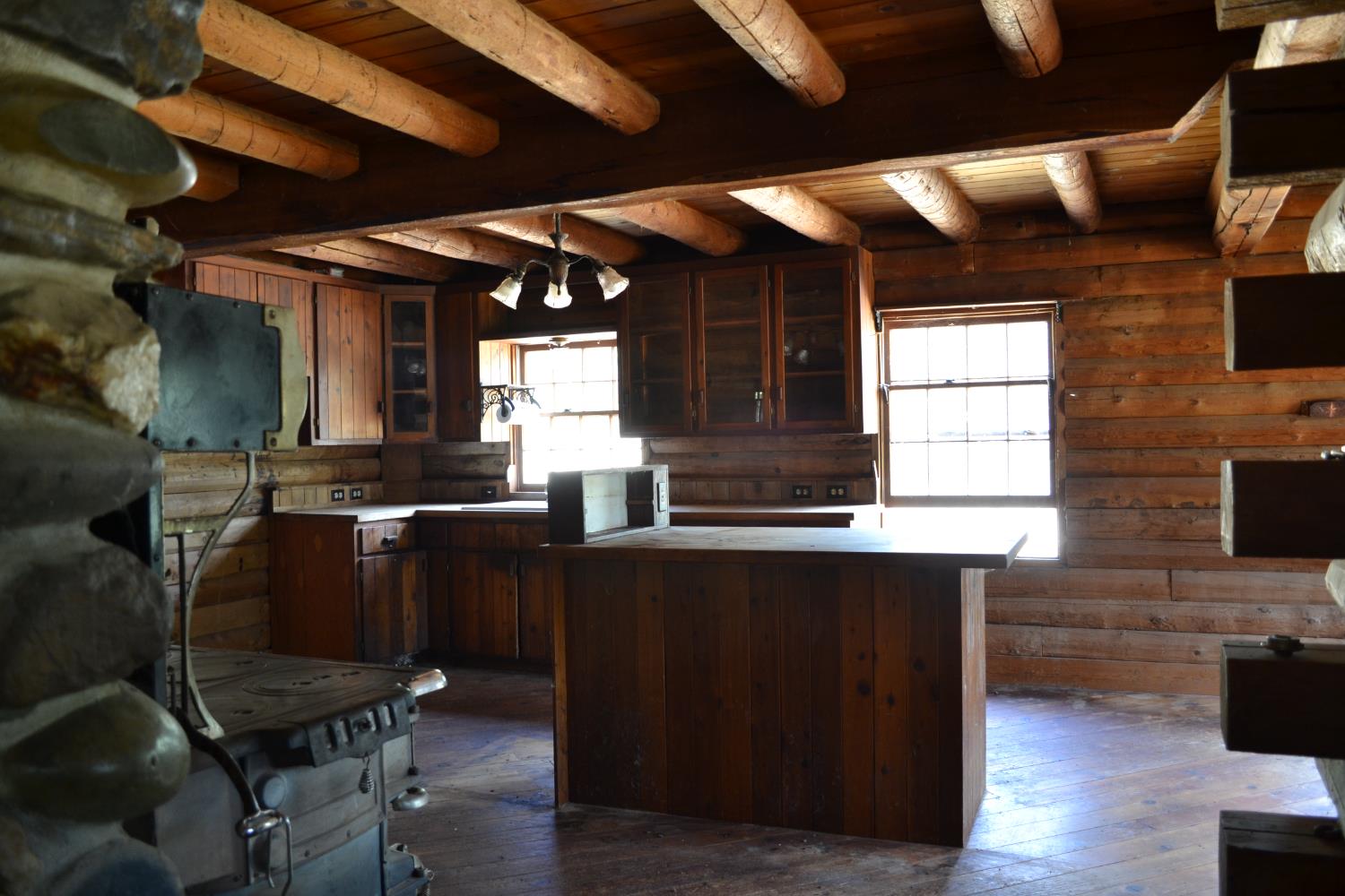 8600 Lodestone Road Somerset, CA 95684 - Photo 10 of 63 a kitchen with stainless steel appliances wooden floors stove top oven and cabinets
