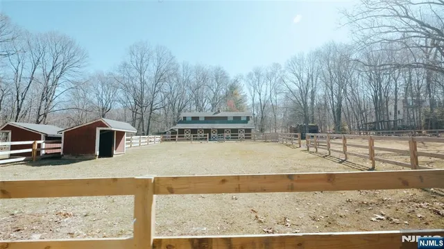a view of a backyard of the house