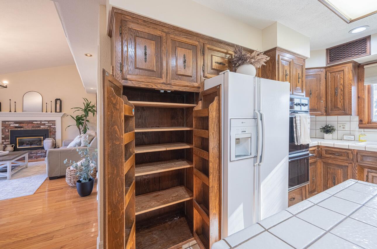 1527 Atherton Way Salinas, CA 93906 - Photo 13 of 64 a kitchen with stainless steel appliances a refrigerator and a stove top oven