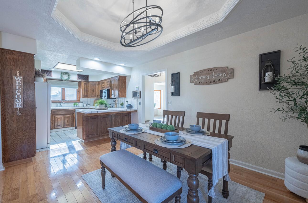 1527 Atherton Way Salinas, CA 93906 - Photo 14 of 64 a view of a dining room with furniture window and wooden floor