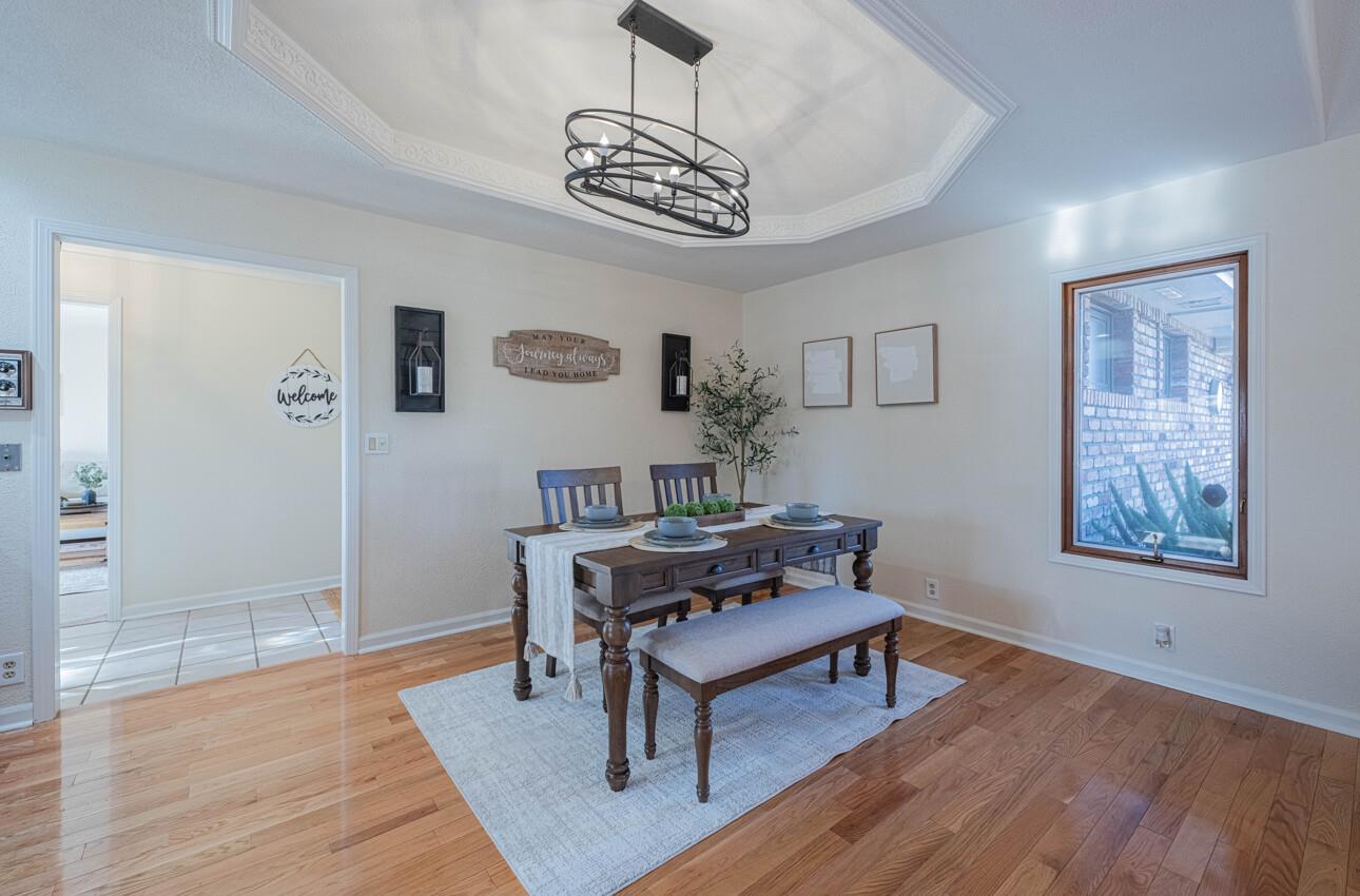 1527 Atherton Way Salinas, CA 93906 - Photo 17 of 64 a living room with furniture and a wooden floor