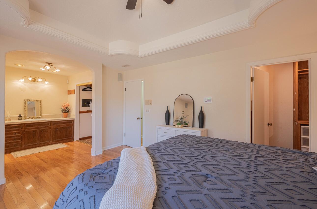 1527 Atherton Way Salinas, CA 93906 - Photo 30 of 64 a spacious bedroom with a large bed and a dresser