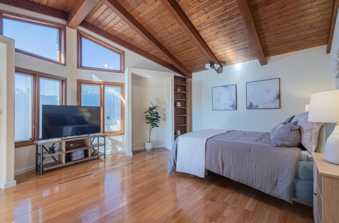 1527 Atherton Way Salinas, CA 93906 - Photo 44 of 64 a bedroom with a bed and a flat screen tv