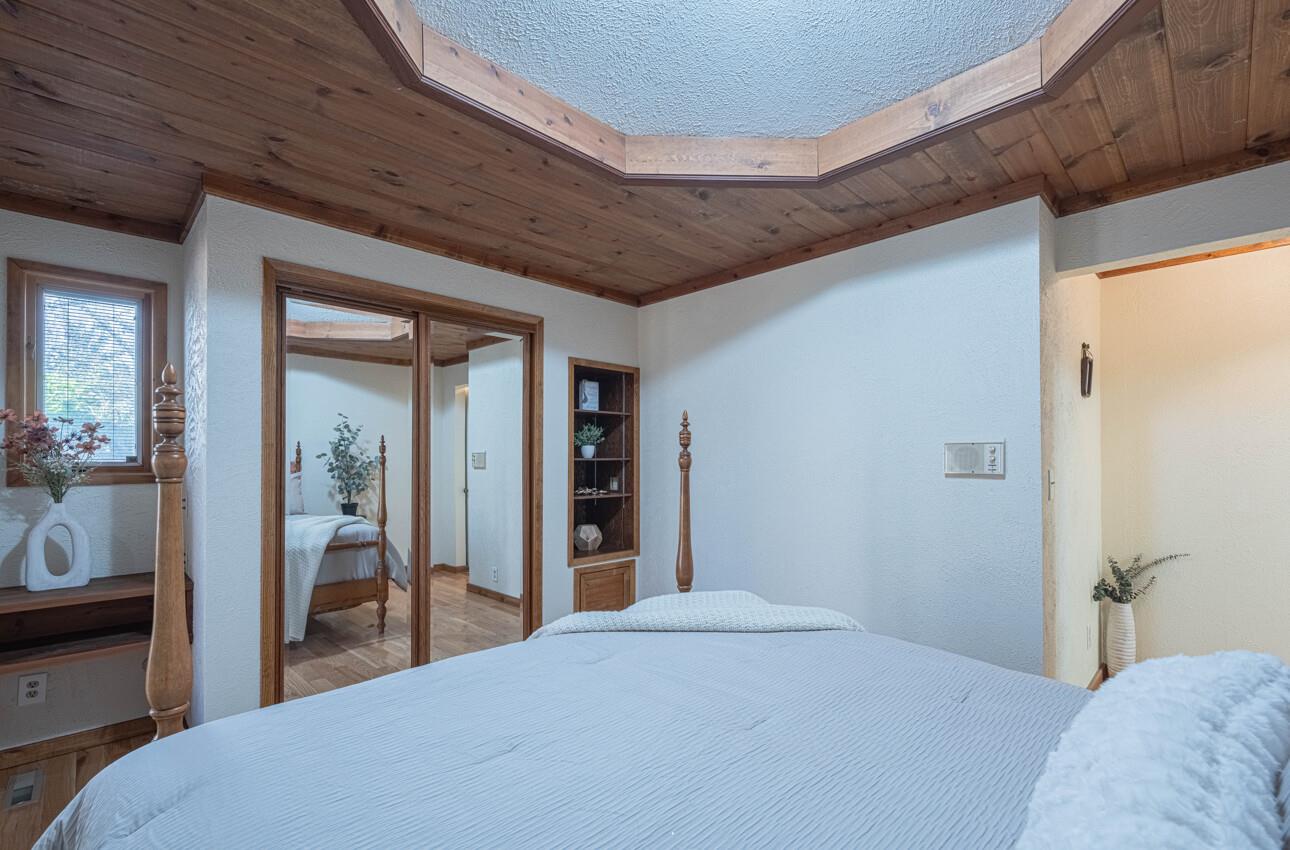 1527 Atherton Way Salinas, CA 93906 - Photo 48 of 64 a bedroom with a bed and glass door